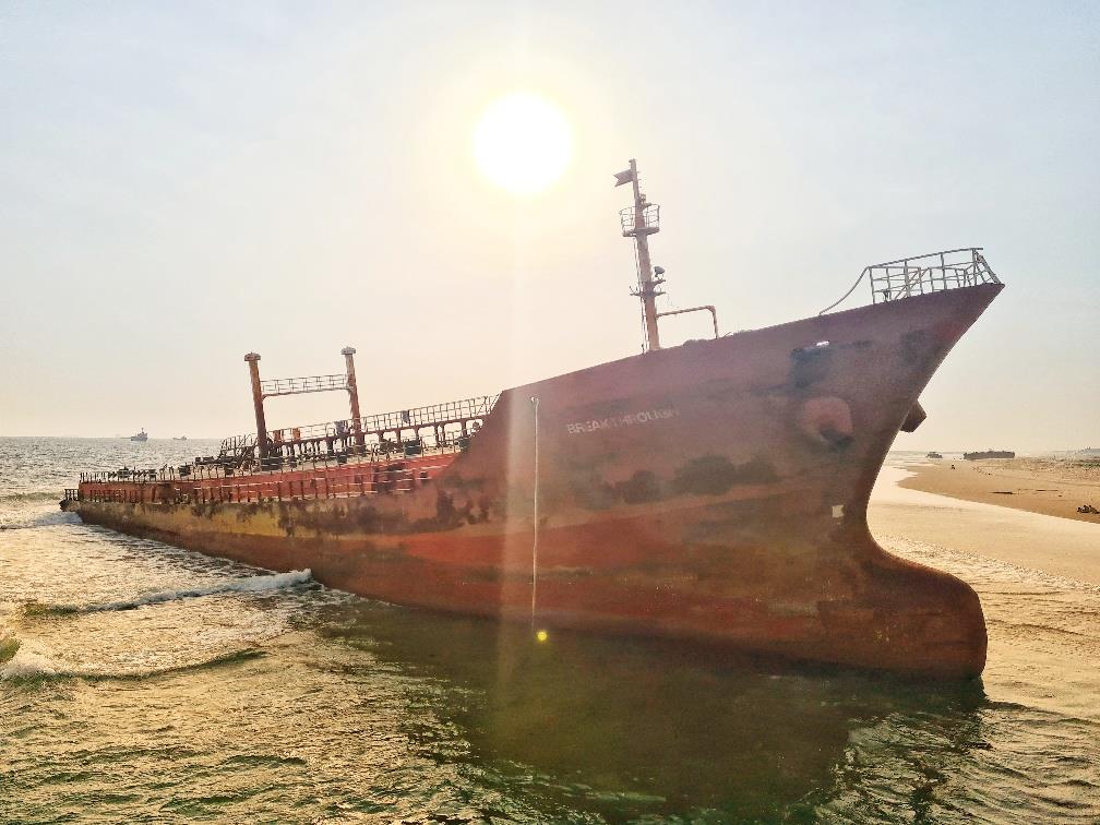 Old container ship on a beach in Nigeria - Credit: expatjournal.org