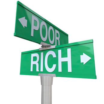Rich Vs Poor Two Way Street Road Signs Poverty Wealth © iQoncept - Fotolia.com