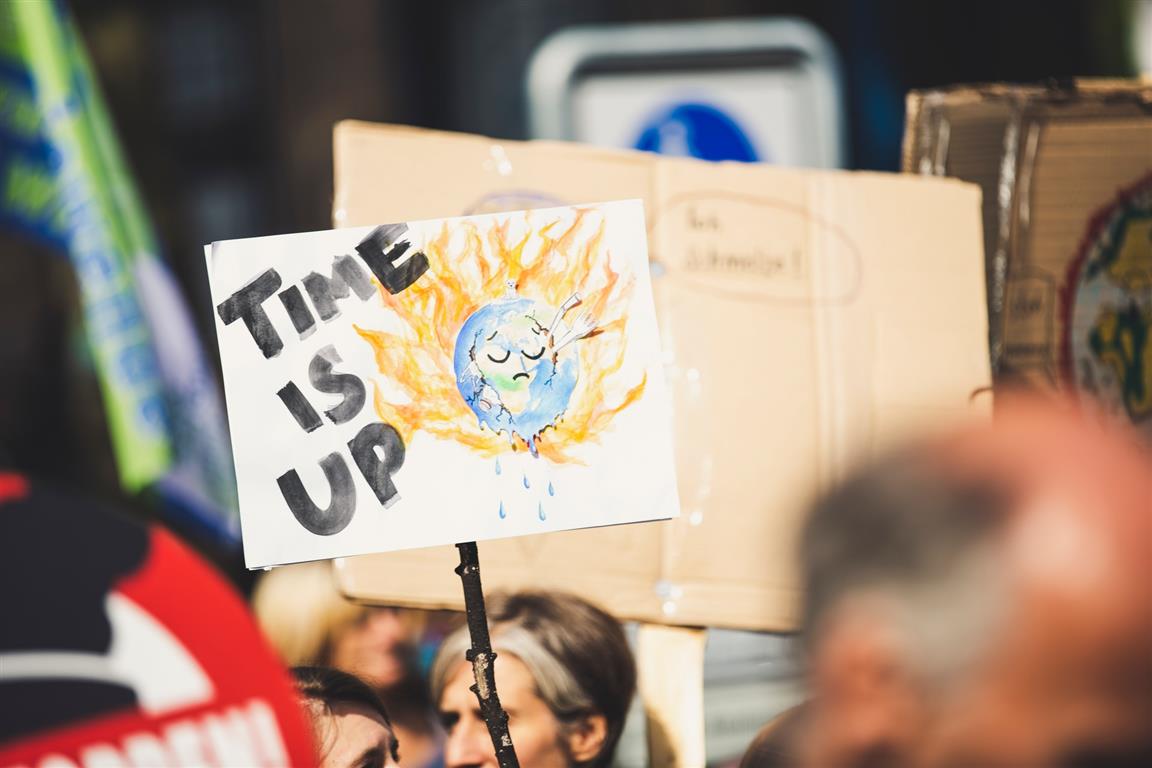 TIME IS UP. Global climate change protest demonstration strike - No Planet B - Photo by Markus Spiske on Unsplash